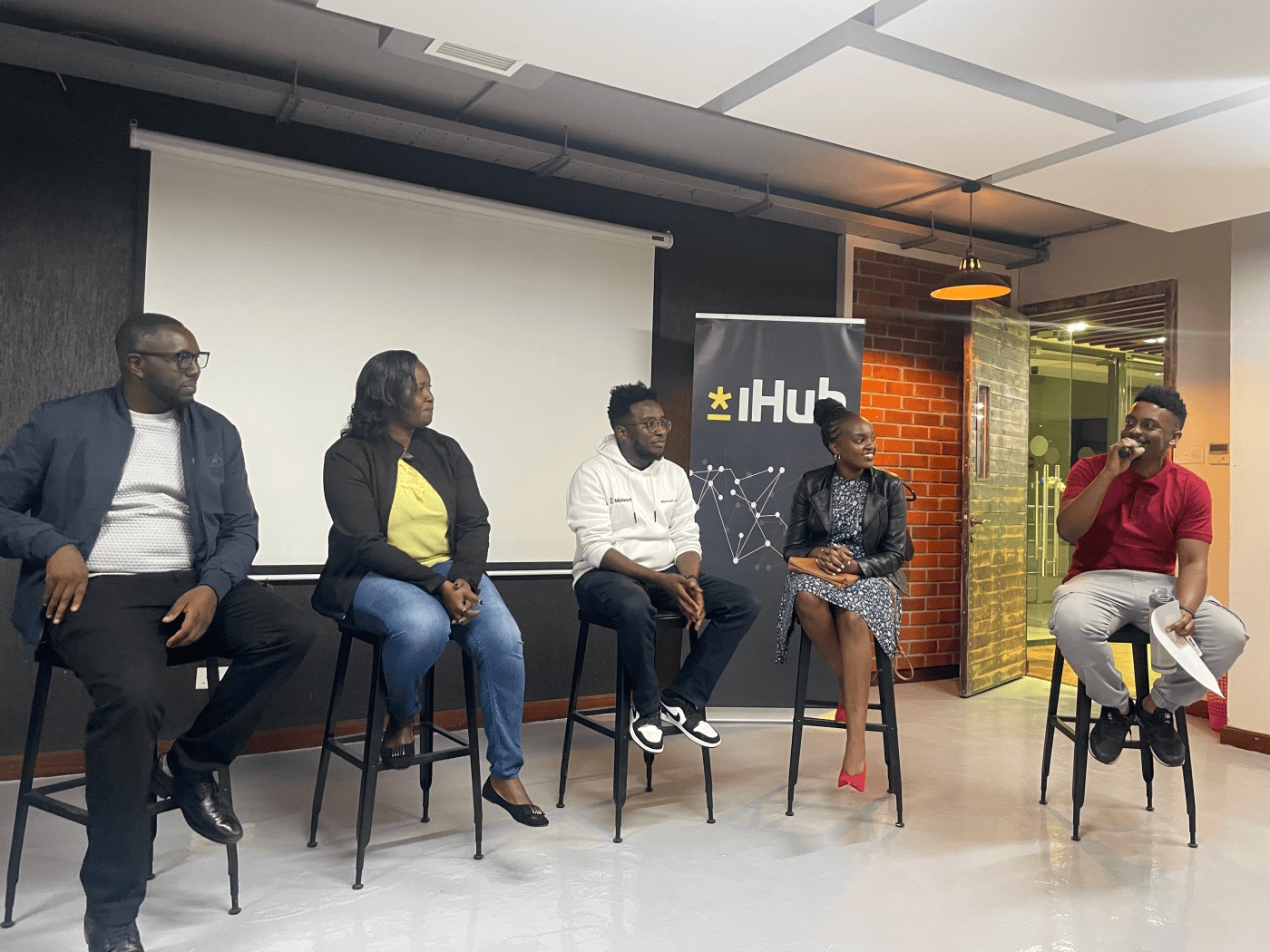 A panel of five speakers at iHub